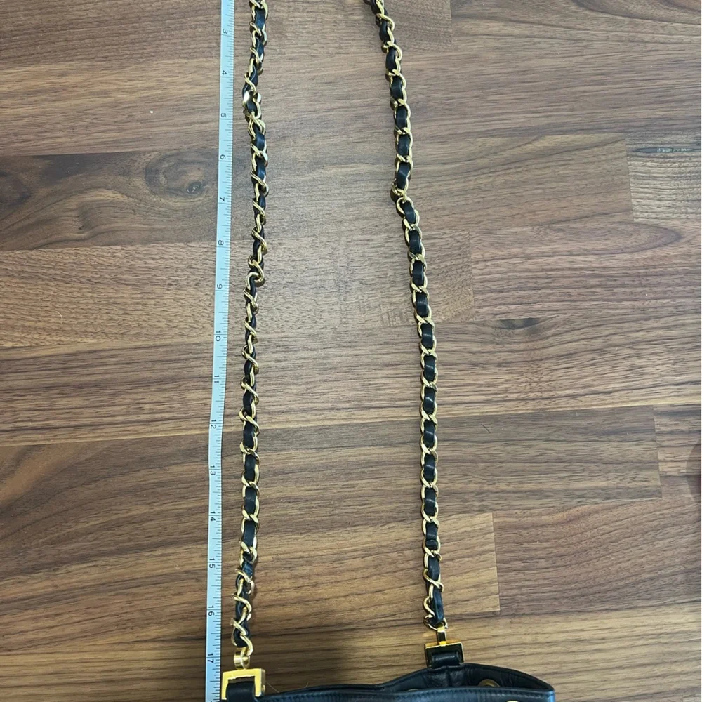 CHANEL Black Quilted Leather Drawstring Bucket Bag with Gold Hardware